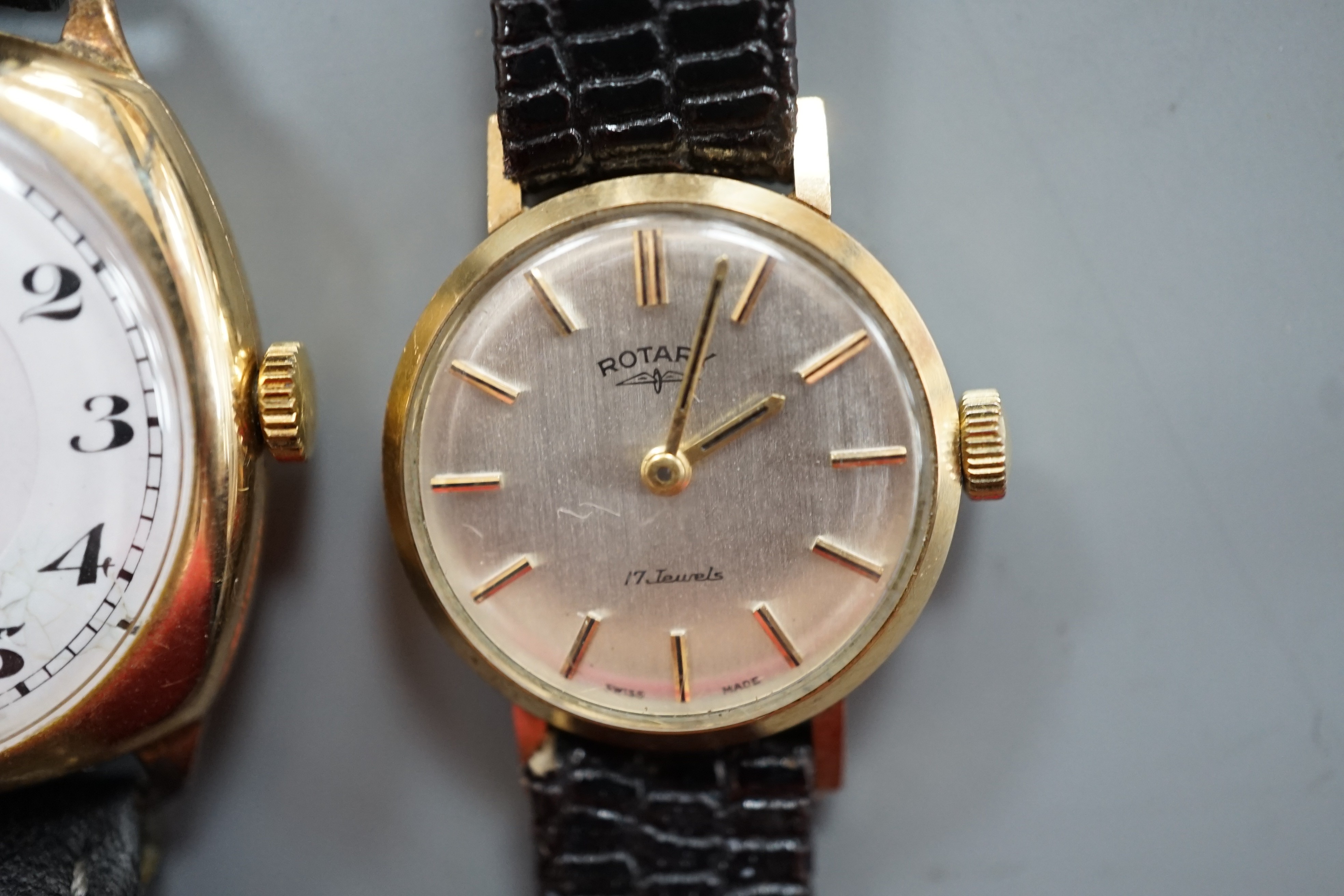 A gentleman's 1930's 9ct gold manual wind wrist watch, with Arabic dial and subsidiary seconds, together with a lady's yellow metal Rotary manual wind wrist watch, both on associated leather straps.